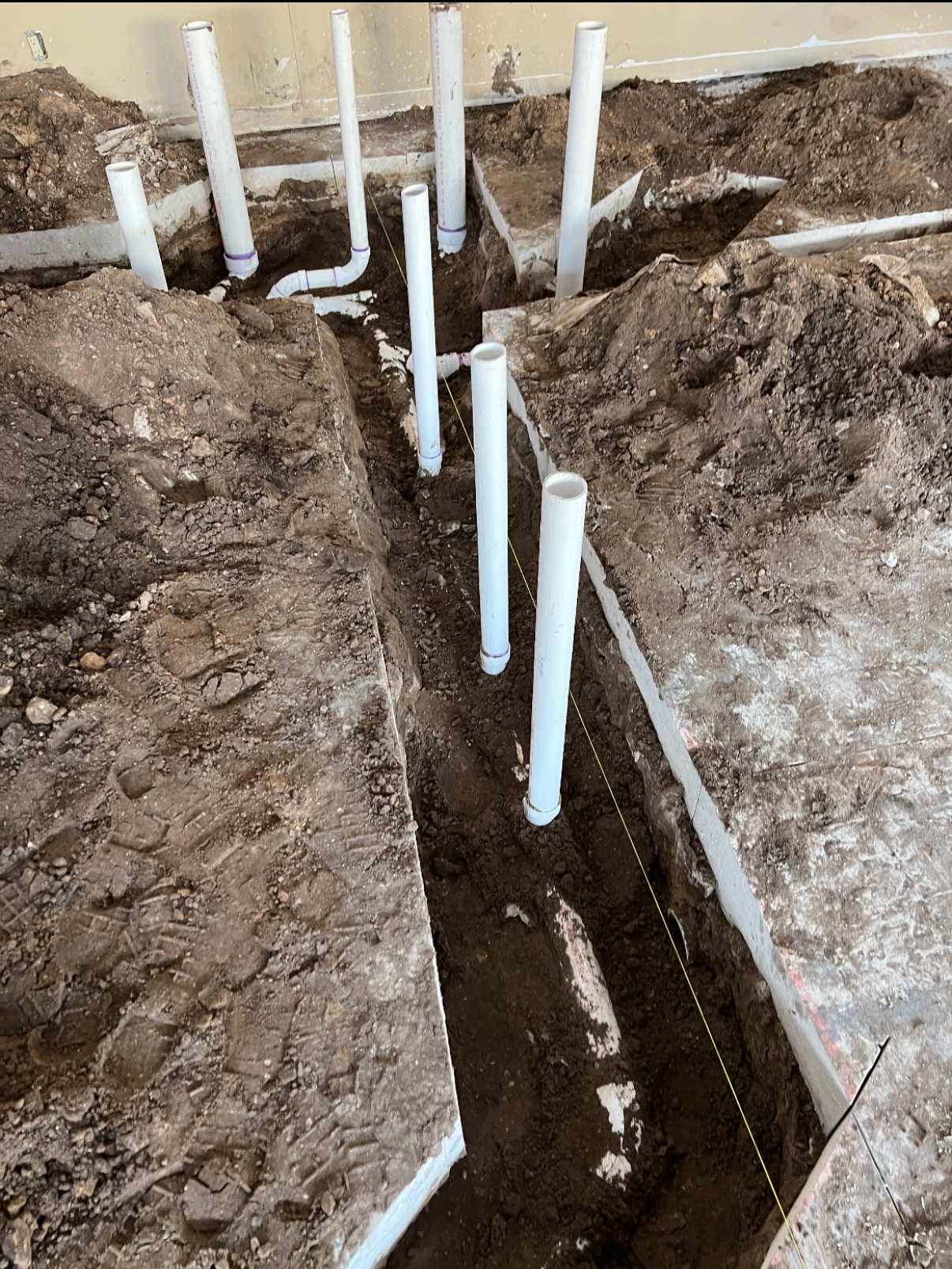 New construction plumbing underground rough-in with Schedule 40 PVC